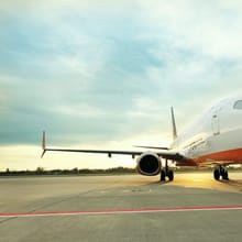 Airliner on the tarmac at sunset