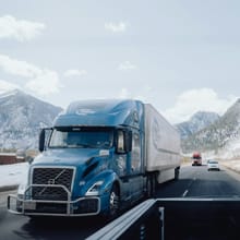 Blue semi truck on a highway