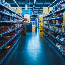 Retail store aisle with stocked shelves