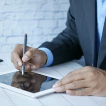Signing a document on a tablet