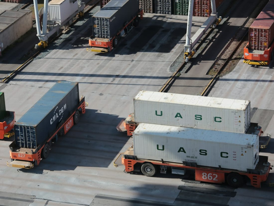 Shipping containers on trailers at a rail and truck terminal
